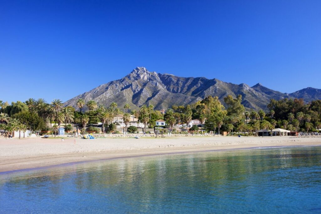 The Golden Mile shoreline in Marbella with La Concha mountain behind