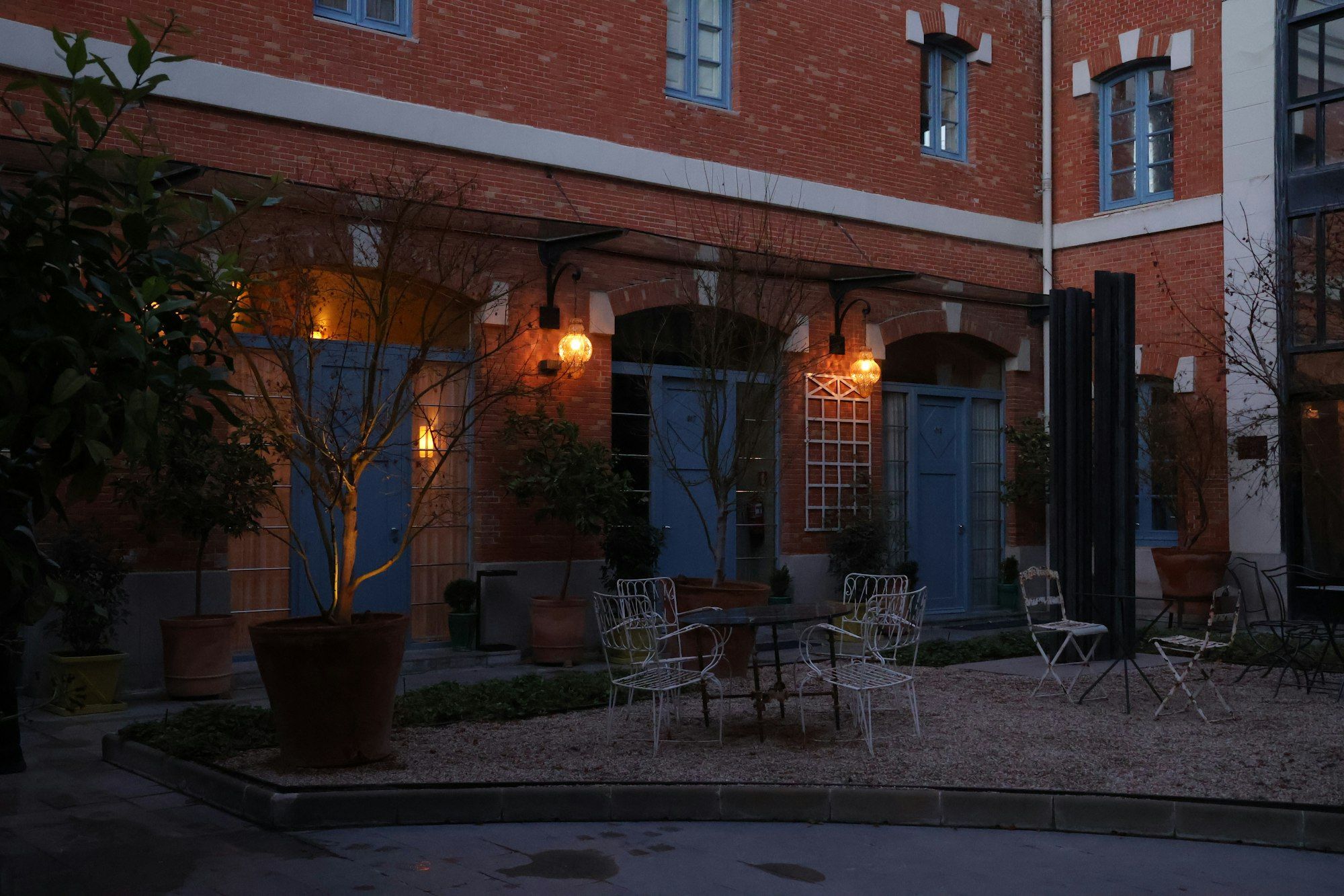 A courtyard terrace at dusk in Madrid
