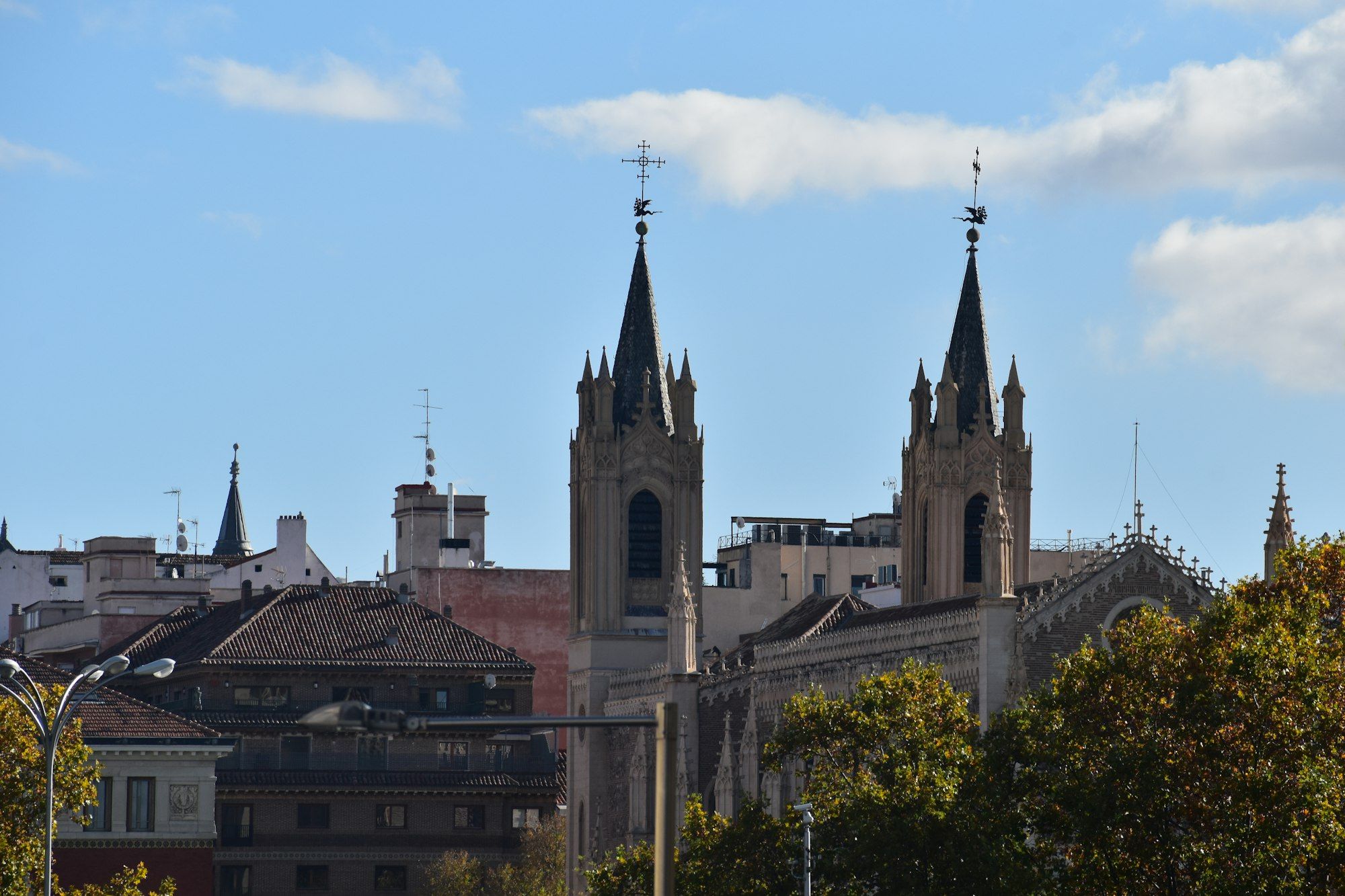 Church spires above the trees near the Retiro, Madrid