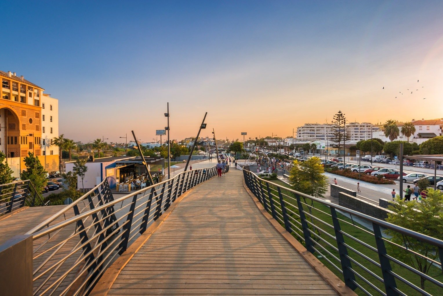 The boardwalk bridge in San Pedro de Alcántara at sunset