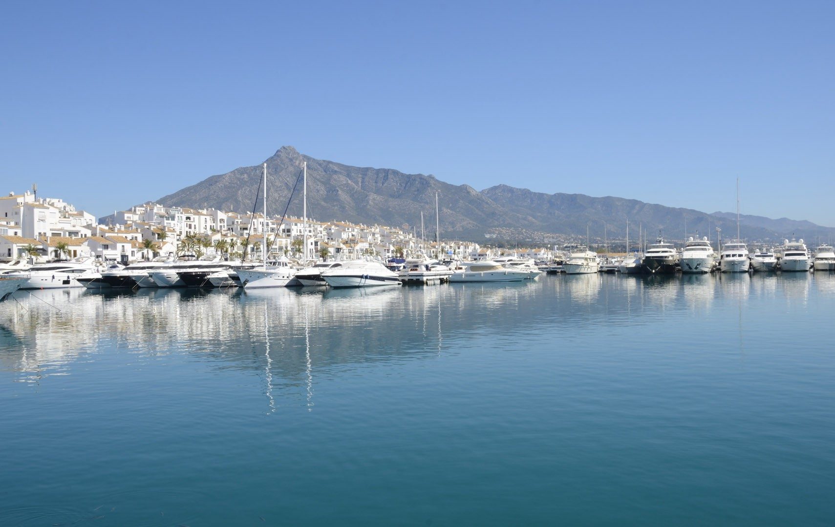 Puerto Banús marina with La Concha in the distance