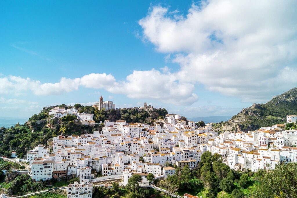 Casares and its castle under a summer sky