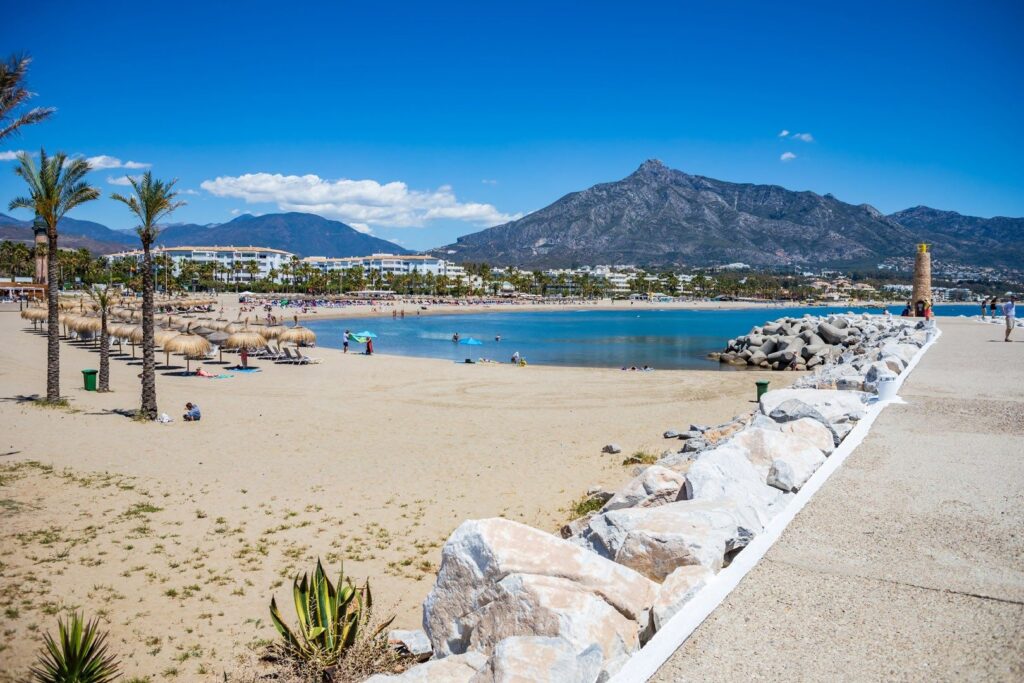 A beach near Puerto Banús with La Concha behind