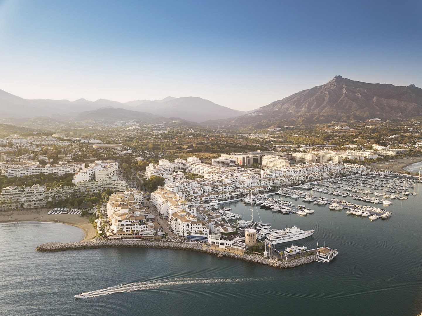 Puerto Banús and its marina from the air, with La Concha behind
