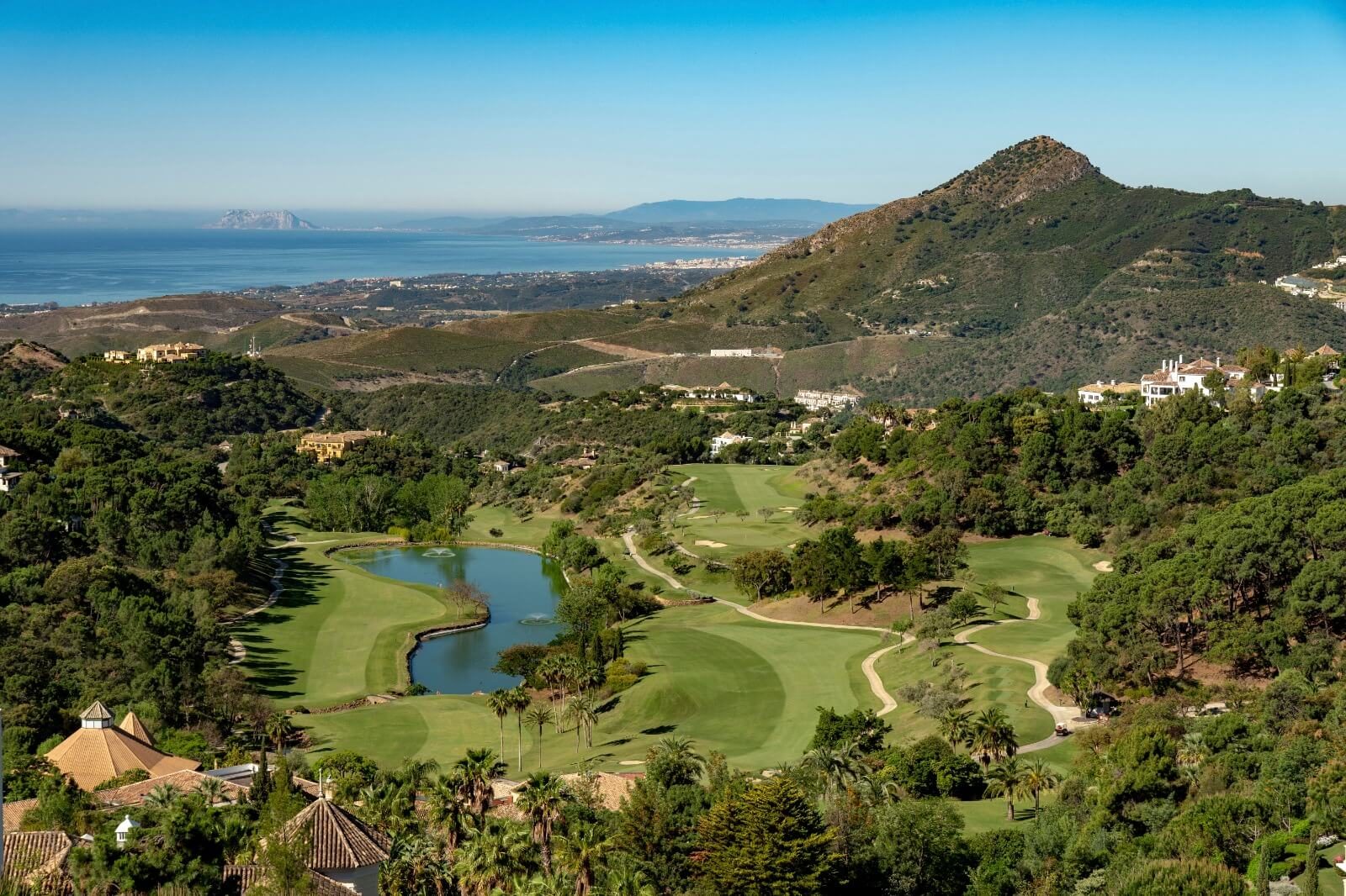 La Zagaleta's hills with the sea and Gibraltar in the distance